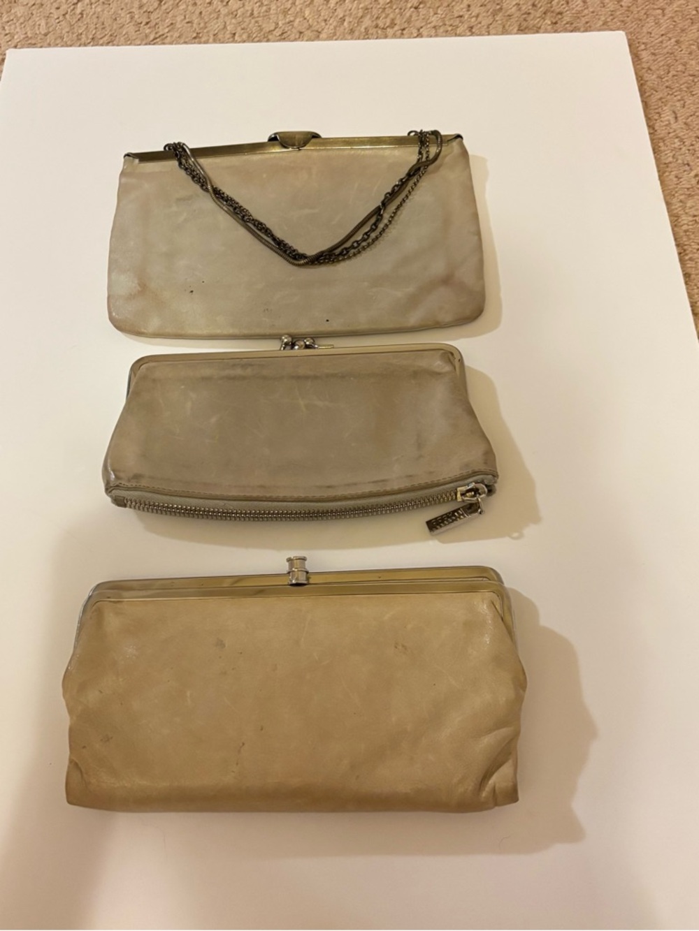 3 hobo international clutches in bone color